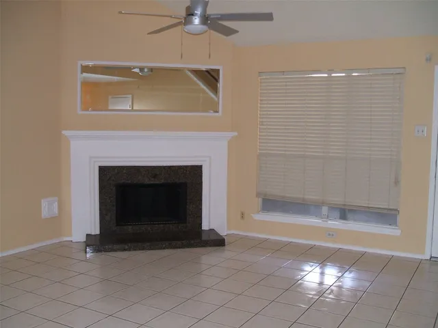 a living room with a fireplace