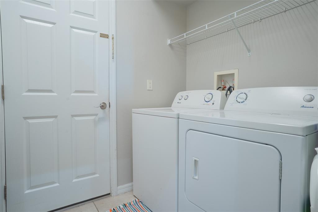 2739 Rutledge Court Winter Haven, FL 33884 - Photo 12 of 24 a utility room with dryer and washer