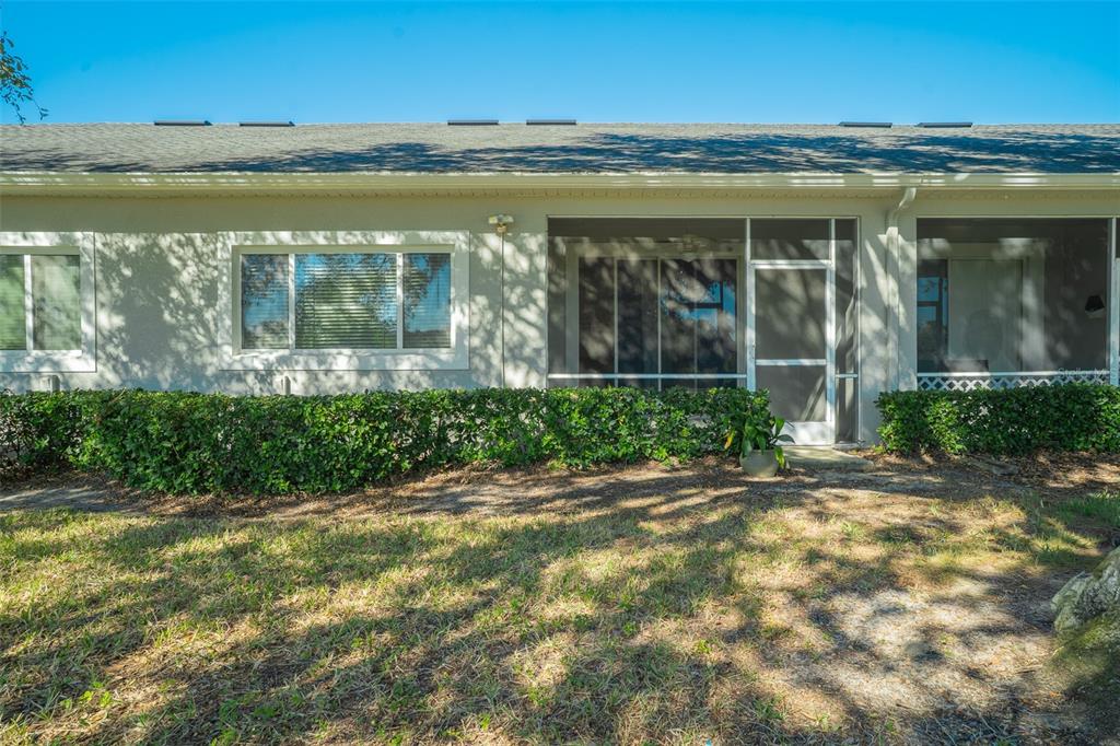 2739 Rutledge Court Winter Haven, FL 33884 - Photo 15 of 24 a view of a brick house with a big yard