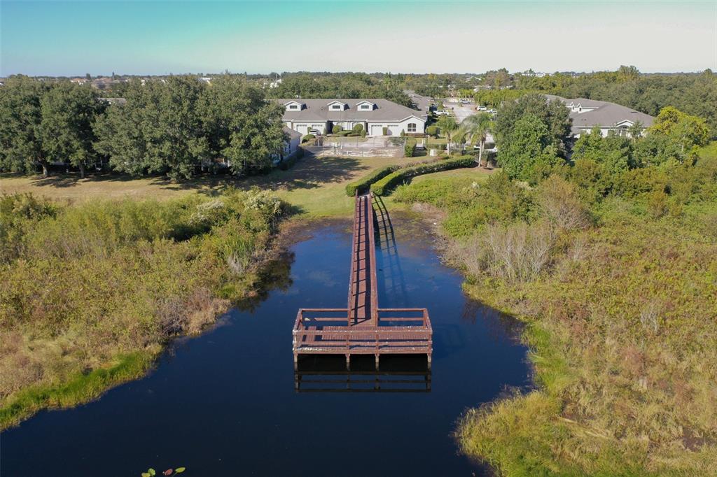 2739 Rutledge Court Winter Haven, FL 33884 - Photo 21 of 24 a view of a lake in middle of the town