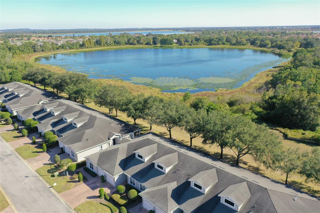 2739 Rutledge Court Winter Haven, FL 33884 - Photo 24 of 24 an aerial view of residential houses with outdoor space and ocean view