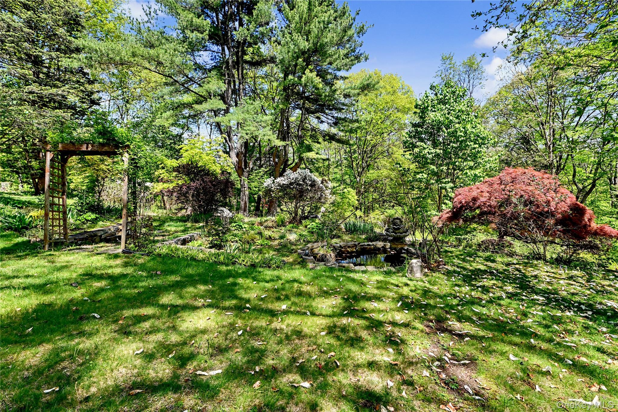 631 Croton Falls Road Carmel, NY 10512 - Photo 36 of 43 a view of a garden with a tree