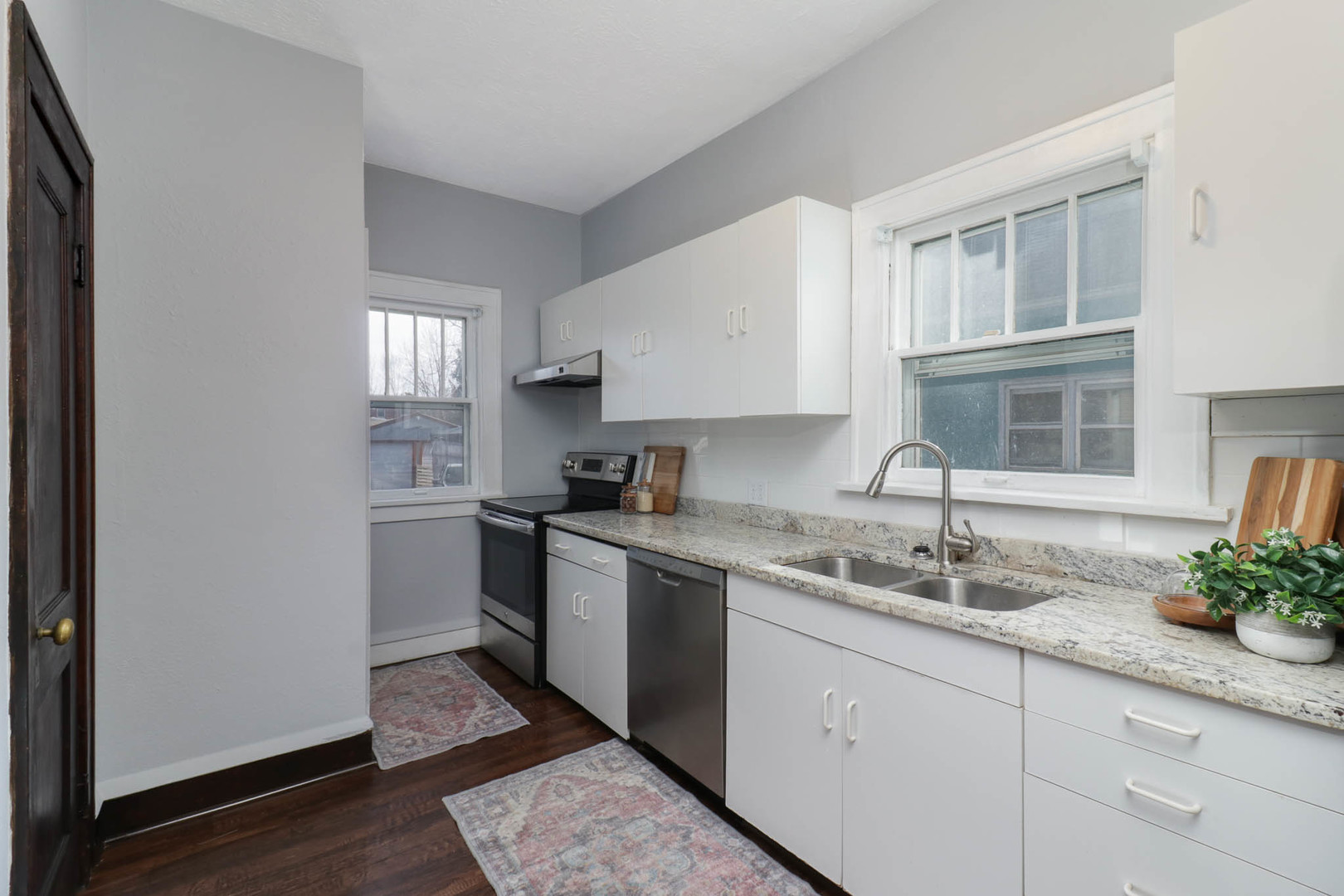 508 North School Street Normal, IL 61761 - Photo 12 of 38 a kitchen with a sink cabinets and window