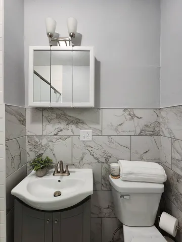 a bathroom with a sink and a toilet
