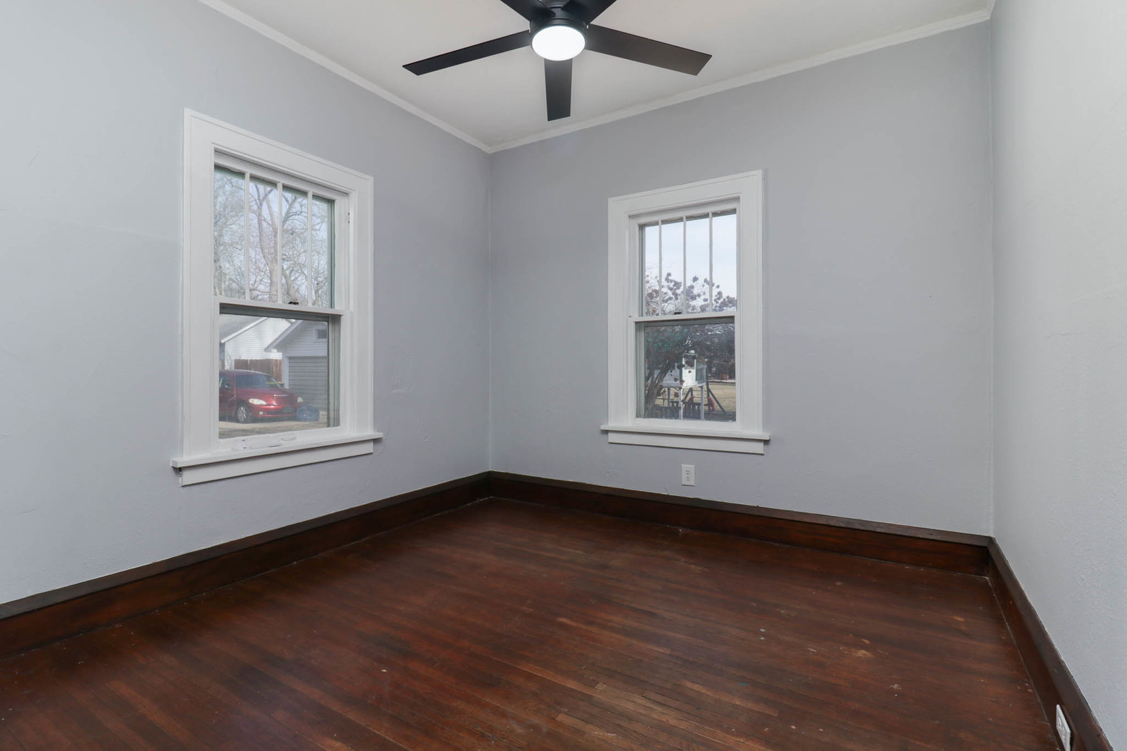 508 North School Street Normal, IL 61761 - Photo 24 of 38 a view of an empty room with wooden floor and a window