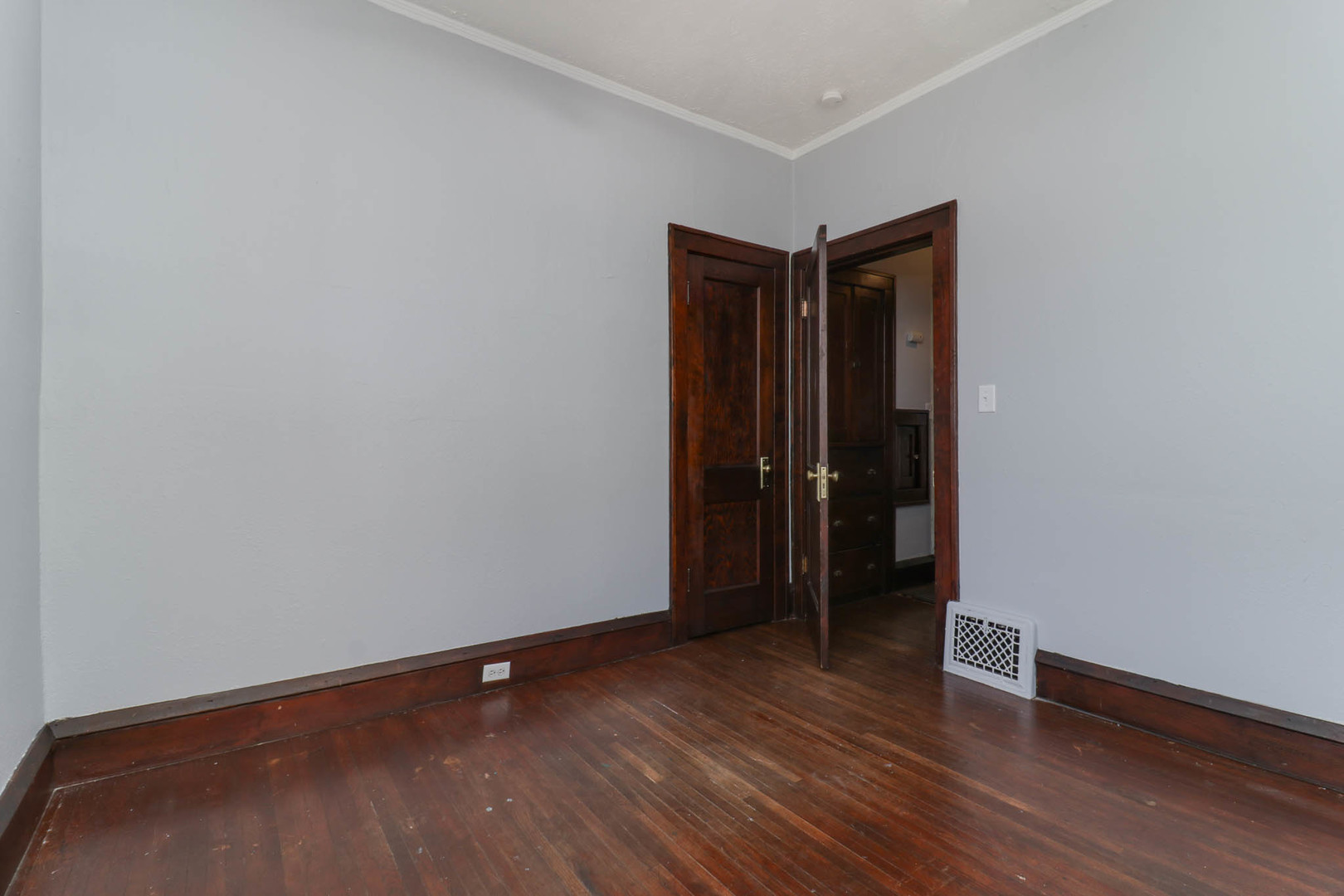 508 North School Street Normal, IL 61761 - Photo 25 of 38 a view of empty room with wooden floor