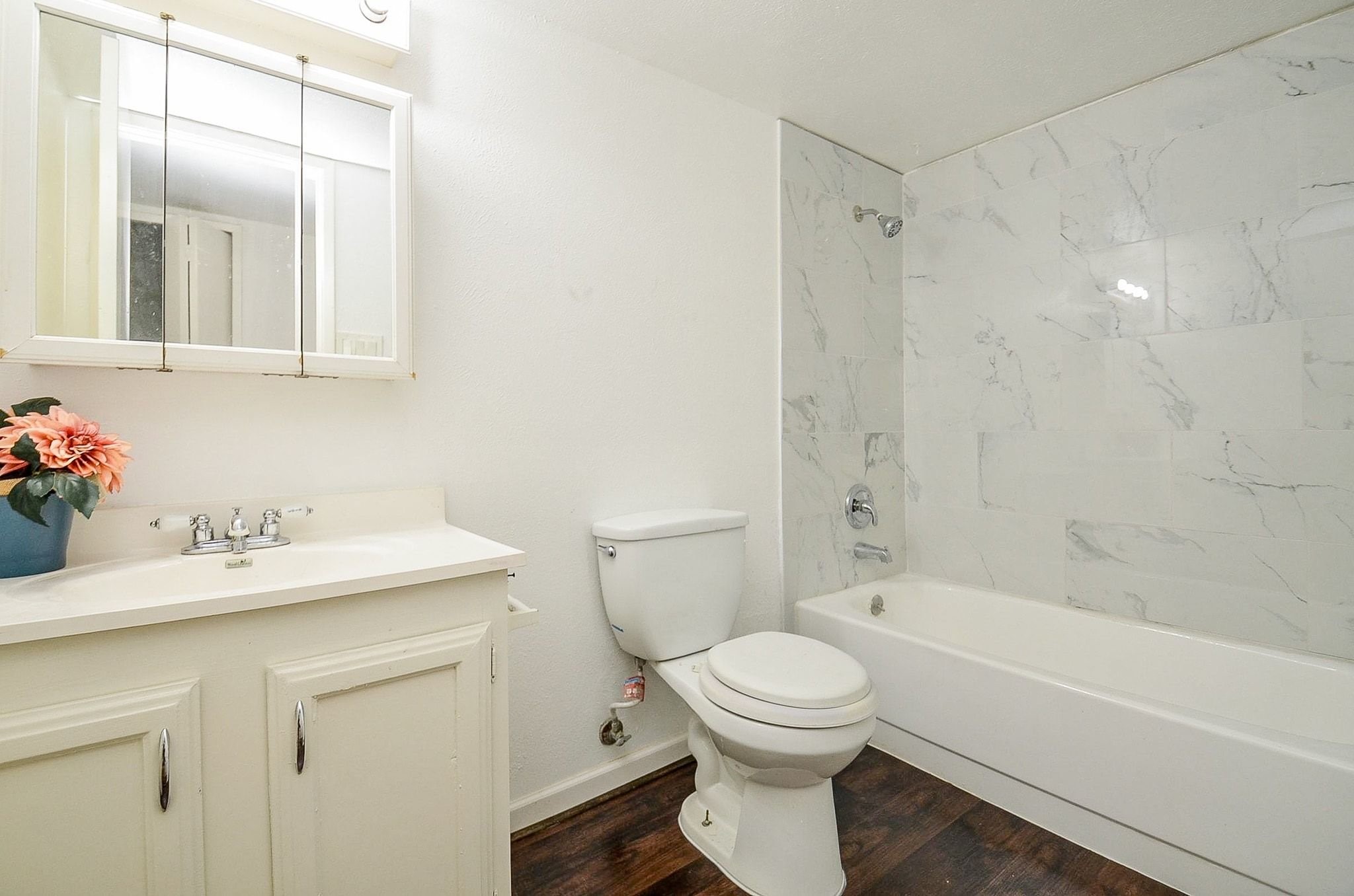 17518 Autumn Trails Lane Houston, TX 77084 - Photo 12 of 30 a bathroom with a sink toilet and shower