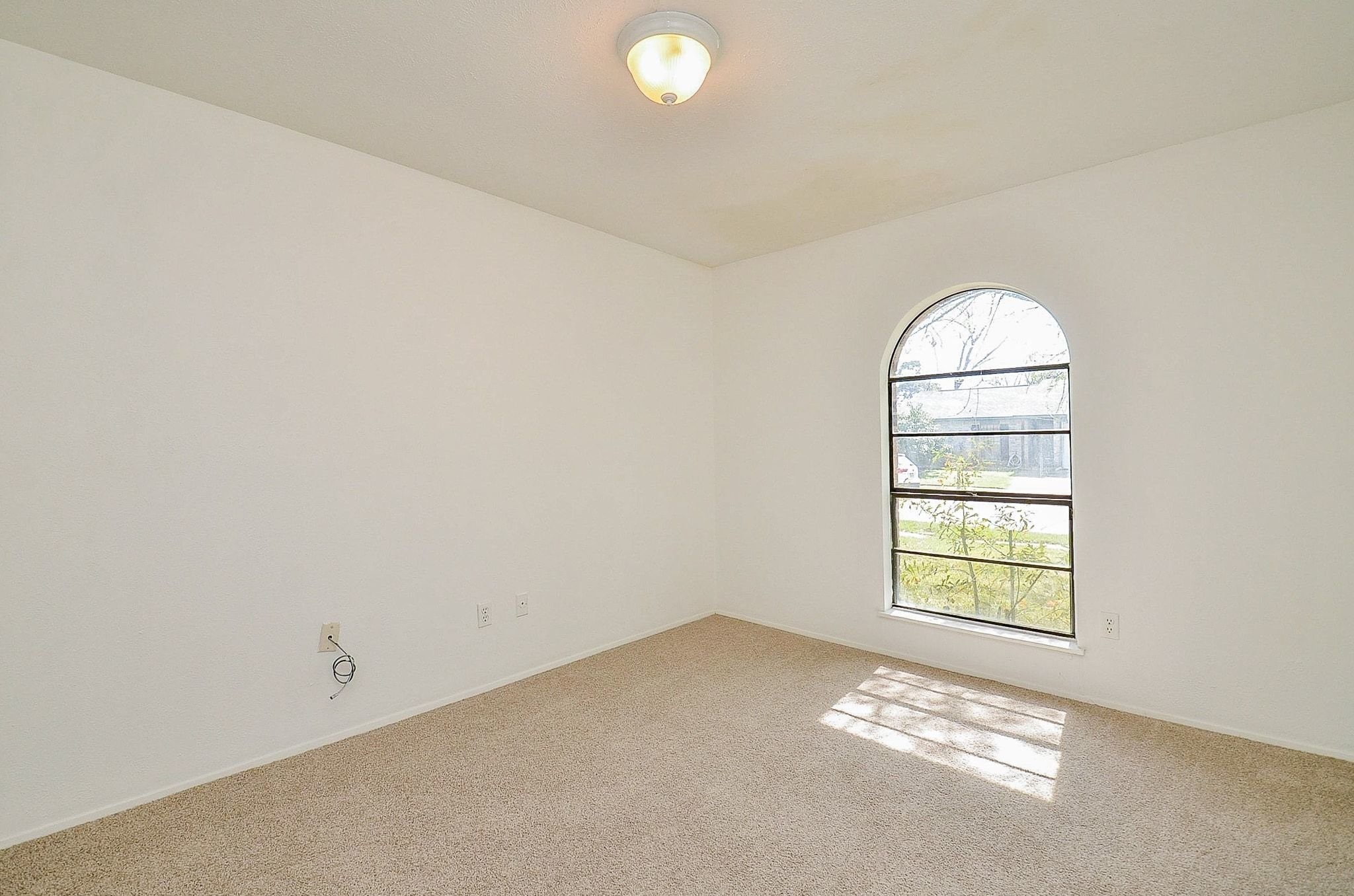 17518 Autumn Trails Lane Houston, TX 77084 - Photo 21 of 30 an empty room with windows