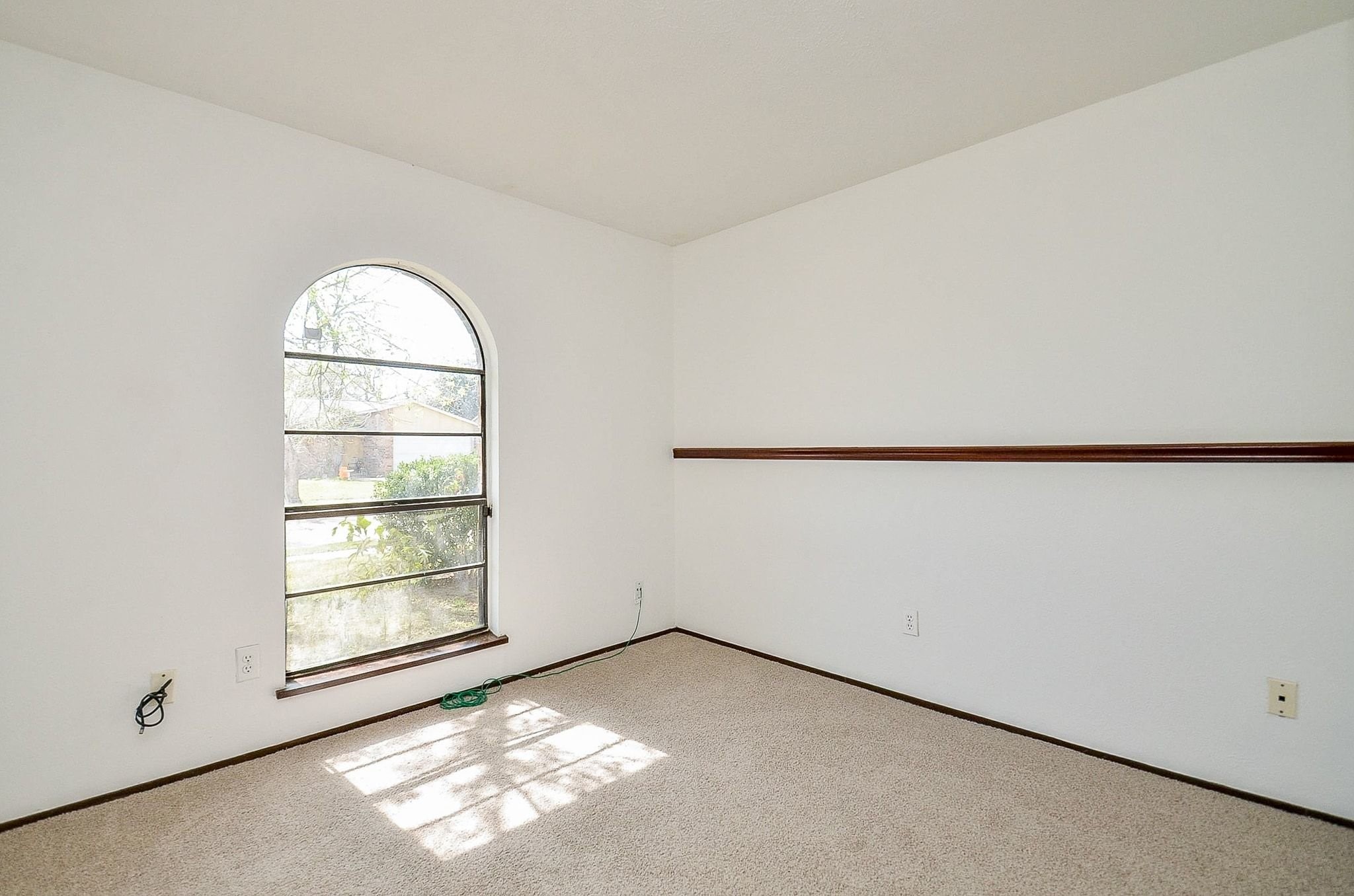 17518 Autumn Trails Lane Houston, TX 77084 - Photo 22 of 30 an empty room with a window