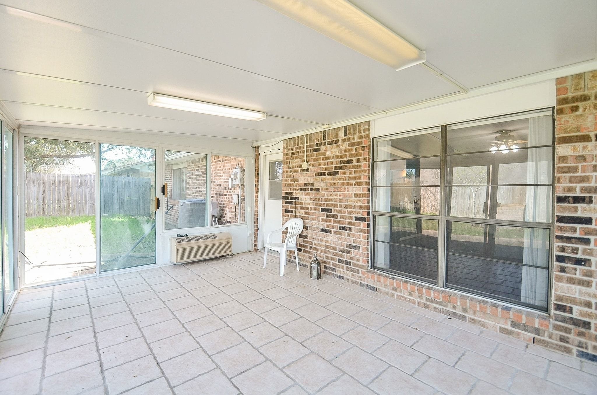 17518 Autumn Trails Lane Houston, TX 77084 - Photo 23 of 30 a spacious bedroom with a large bed and a large window