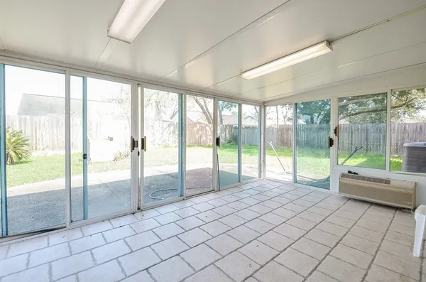 a view of an empty room and window