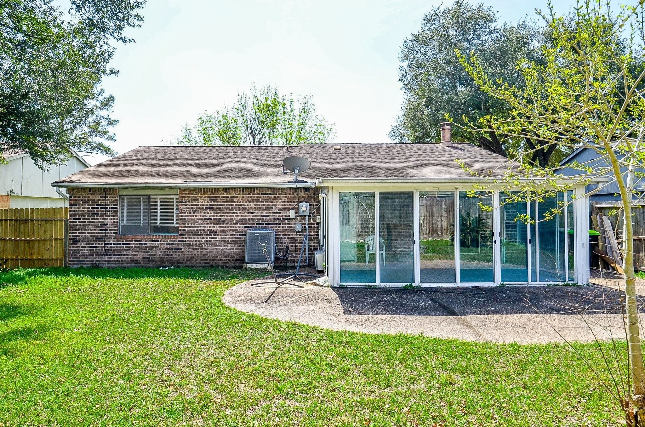 17518 Autumn Trails Lane Houston, TX 77084 - Photo 26 of 30 a front view of a house with a yard and porch