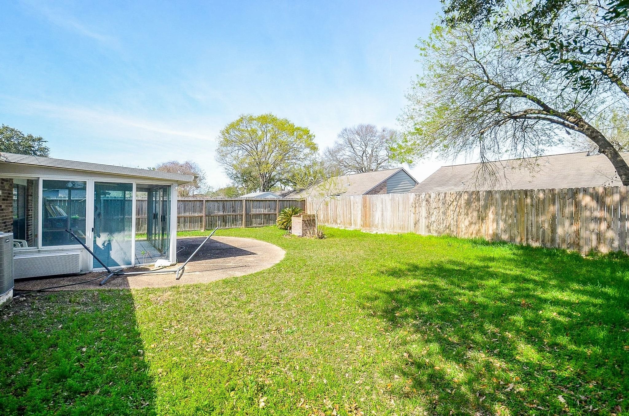 17518 Autumn Trails Lane Houston, TX 77084 - Photo 28 of 30 a view of a house with backyard and sitting area