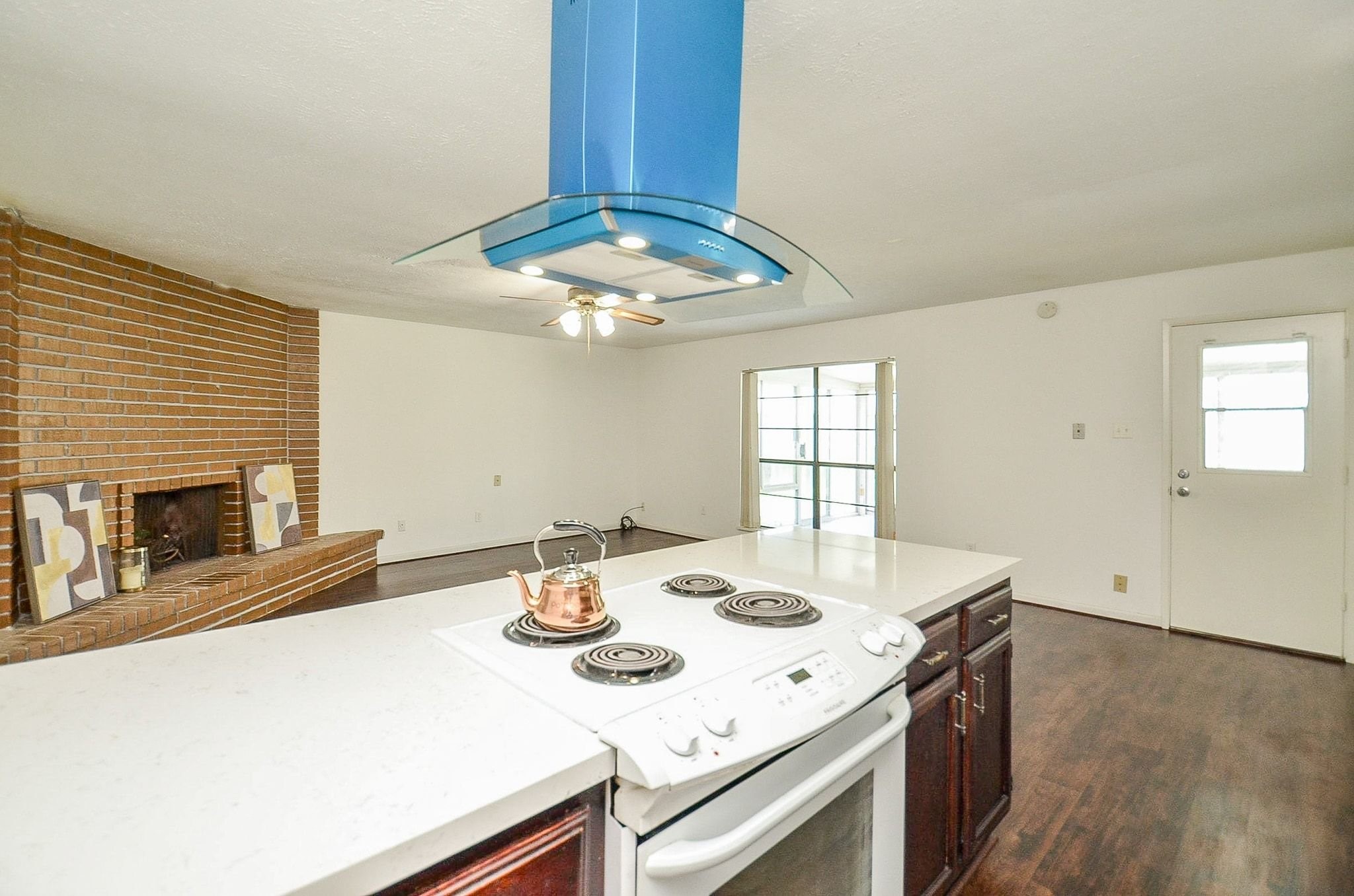17518 Autumn Trails Lane Houston, TX 77084 - Photo 5 of 30 a view of a dining room with furniture and a fireplace