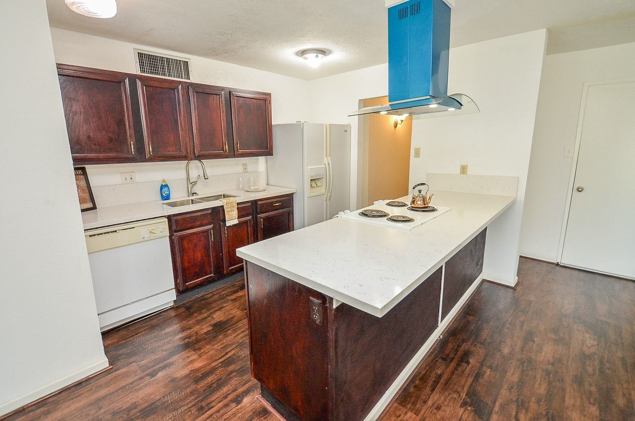 17518 Autumn Trails Lane Houston, TX 77084 - Photo 6 of 30 a kitchen with a sink and cabinets