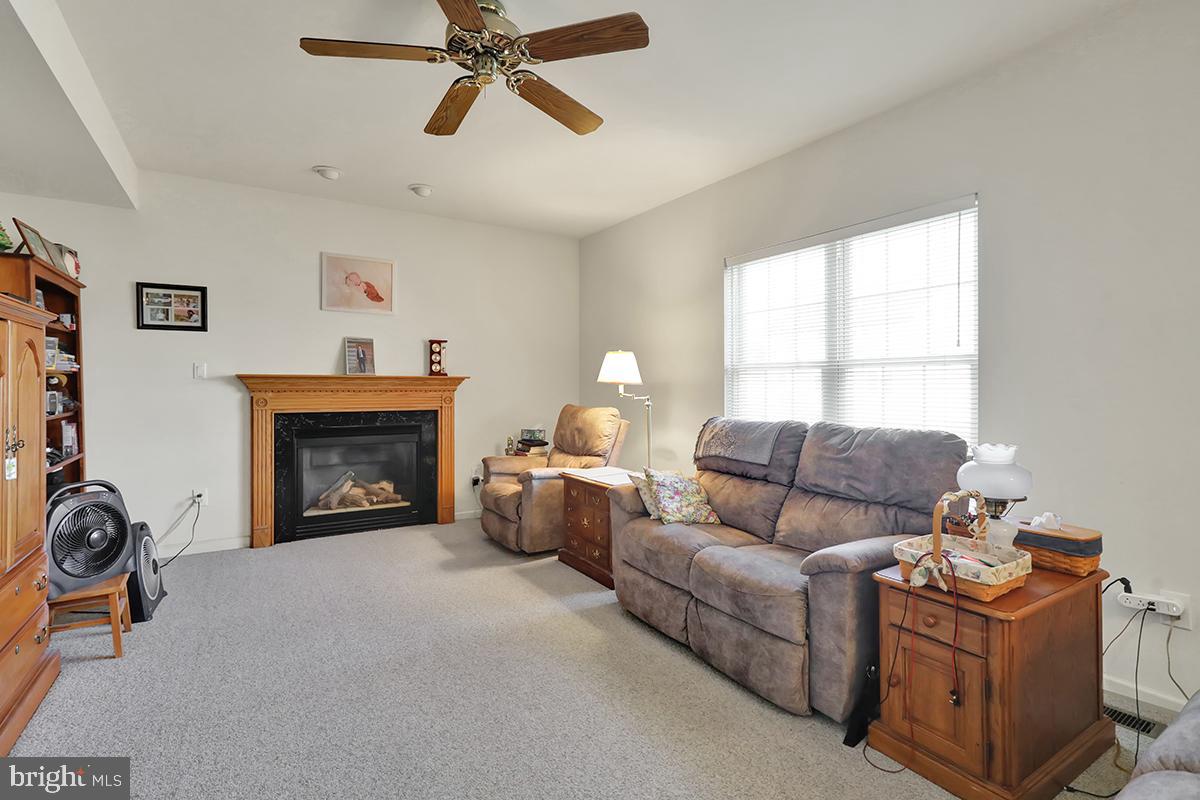 103 Eagles Lane Reading, PA 19608 - Photo 15 of 42 a living room with furniture and a fireplace