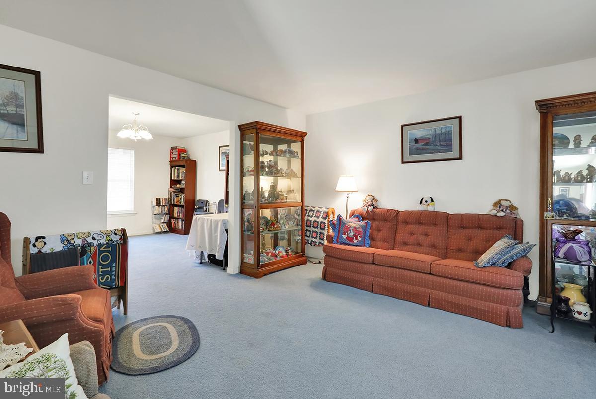 103 Eagles Lane Reading, PA 19608 - Photo 18 of 42 a living room with furniture and a flat screen tv