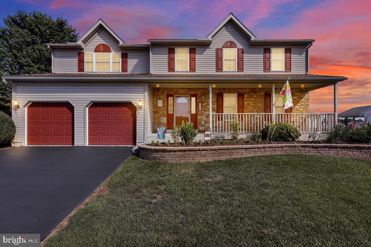 103 Eagles Lane Reading, PA 19608 - Photo 2 of 42 a front view of a house with garden