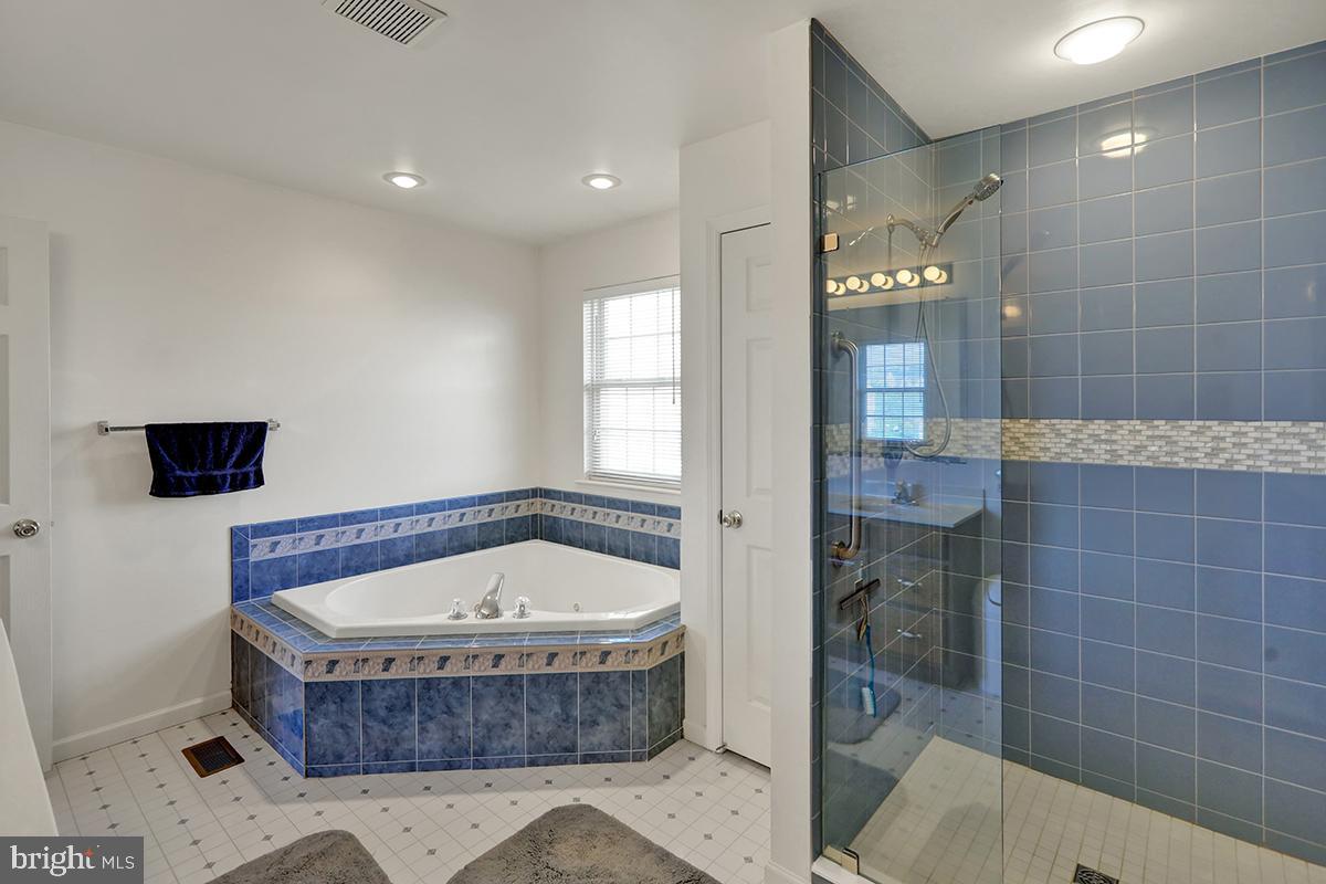 103 Eagles Lane Reading, PA 19608 - Photo 27 of 42 a bathroom with a tub and shower