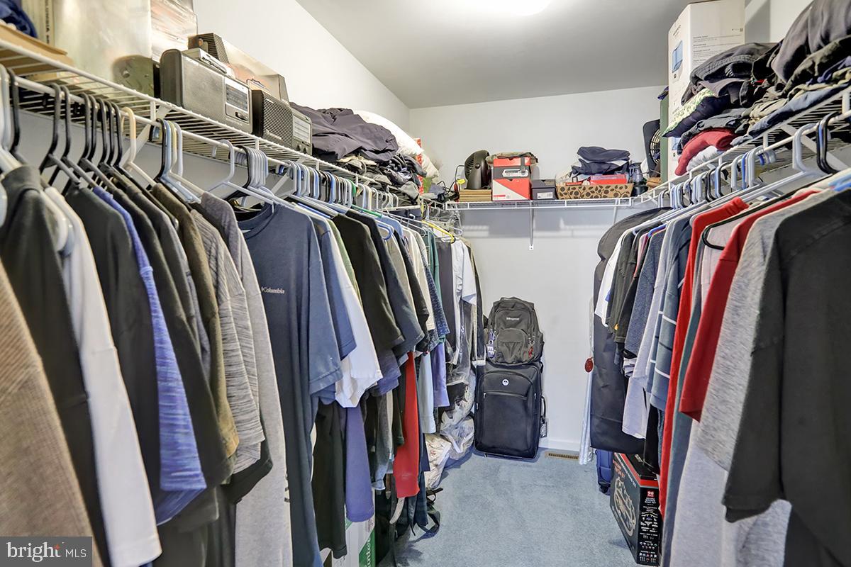 103 Eagles Lane Reading, PA 19608 - Photo 29 of 42 a view of walk in closet with clothes and shoes
