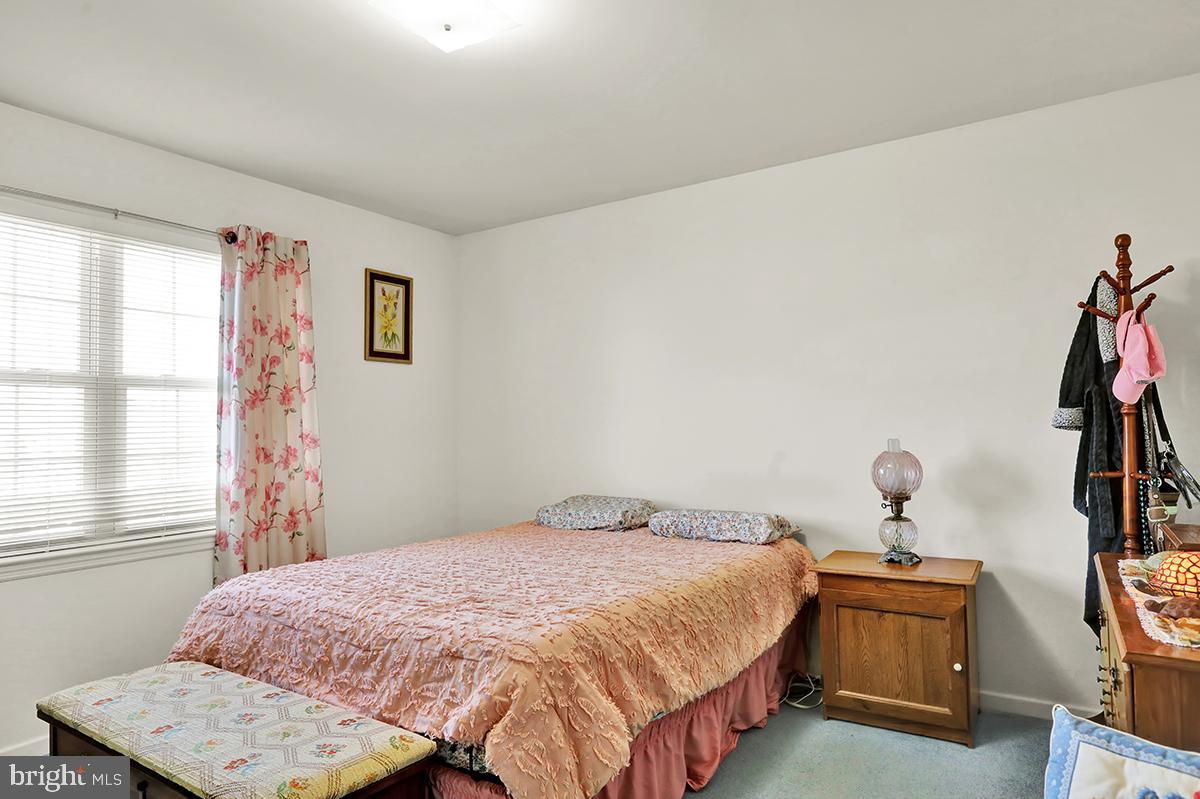 103 Eagles Lane Reading, PA 19608 - Photo 30 of 42 a bedroom with a bed and a window