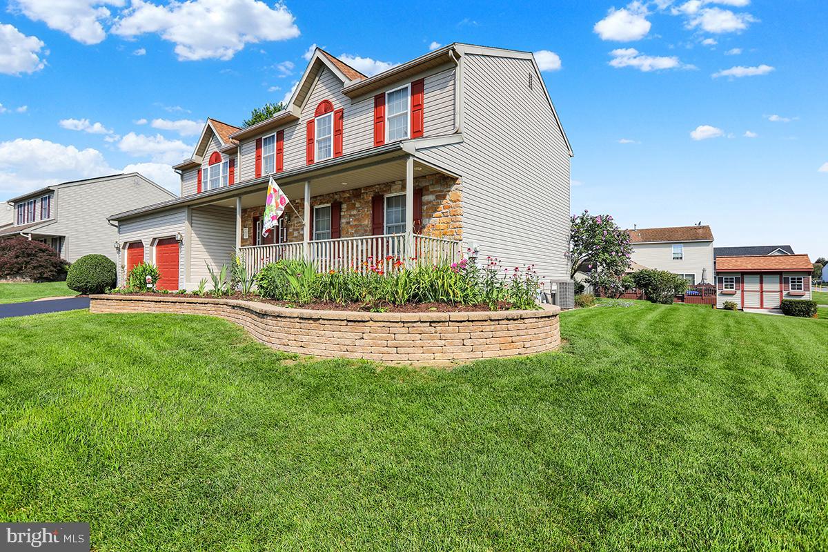 103 Eagles Lane Reading, PA 19608 - Photo 5 of 42 a front view of house with yard and green space
