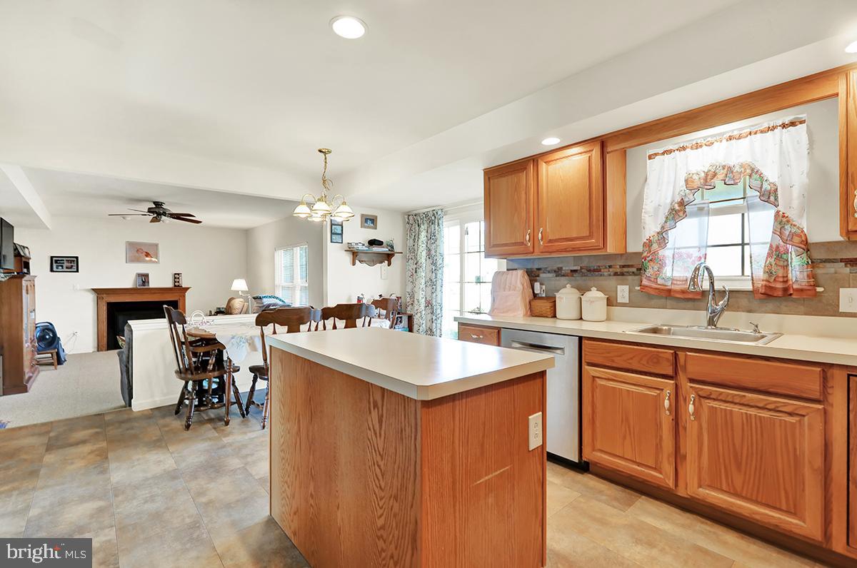 103 Eagles Lane Reading, PA 19608 - Photo 10 of 42 a kitchen with a sink stove and cabinets