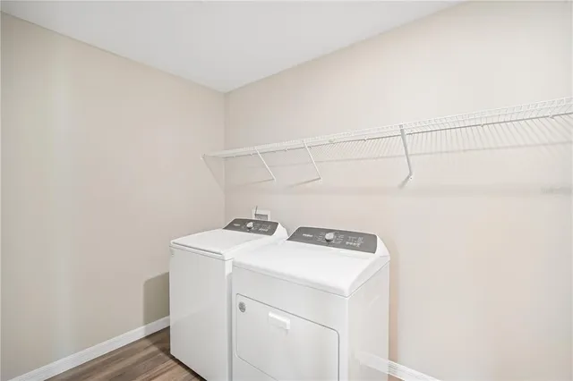 a utility room with dryer and washer