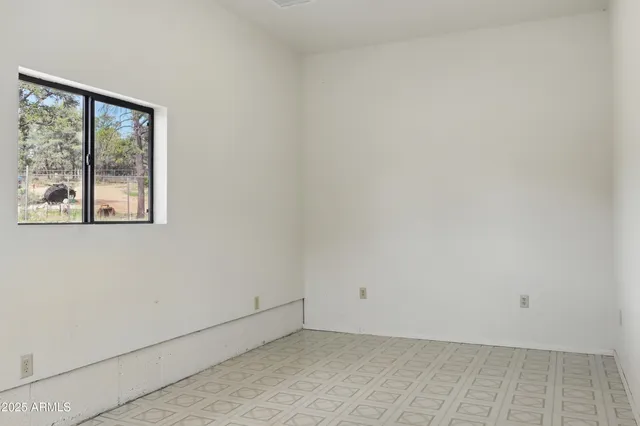 a view of a house with backyard and porch