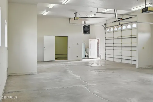 a front view of a house with a garage