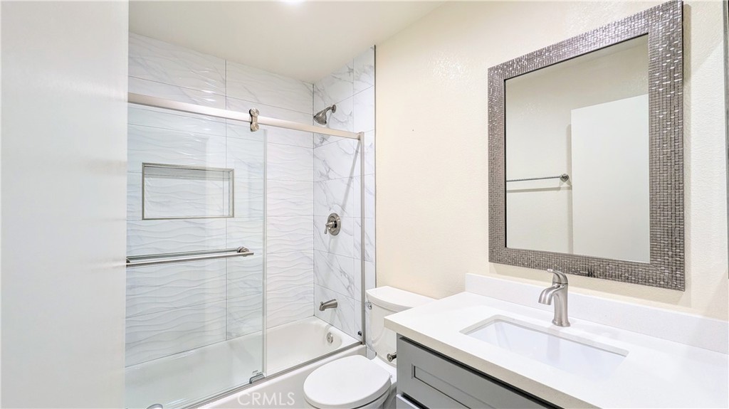 801 South 2nd Street, Unit 3 Alhambra, CA 91801 - Photo 15 of 22 a bathroom with a granite countertop sink toilet and shower