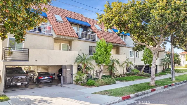 a view of a car parked in front of a house