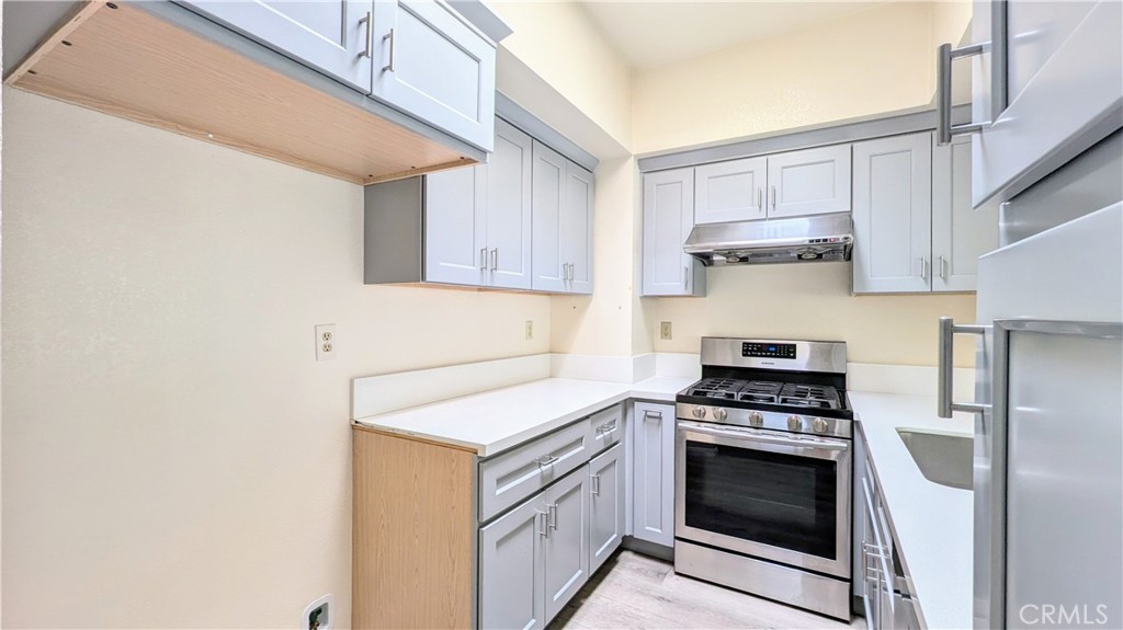 801 South 2nd Street, Unit 3 Alhambra, CA 91801 - Photo 4 of 22 a kitchen with a stove and a sink