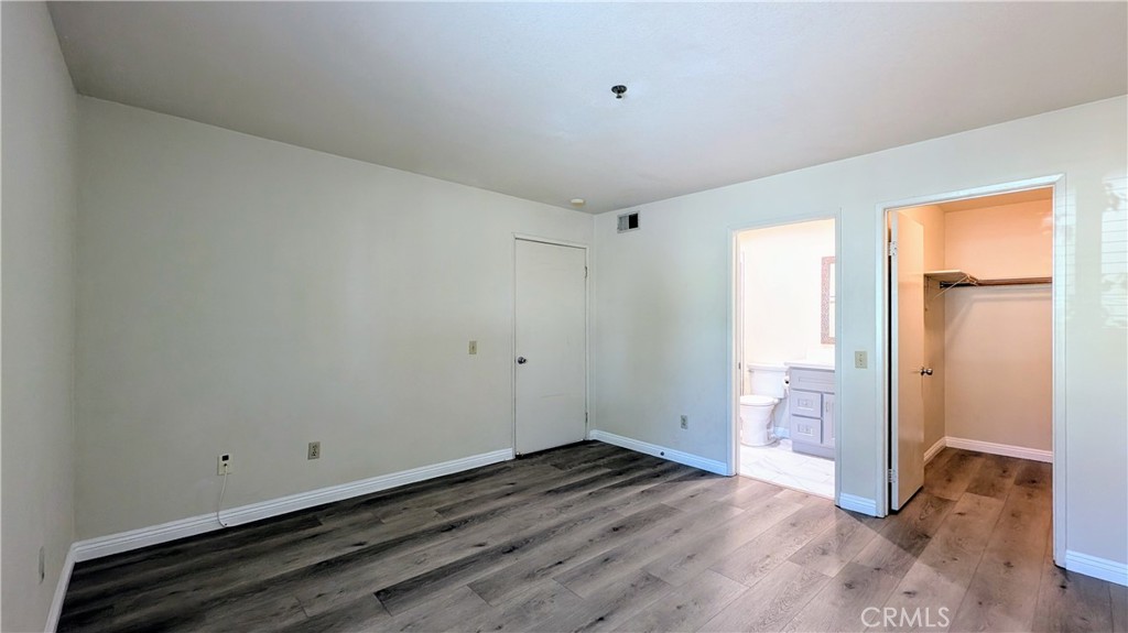801 South 2nd Street, Unit 3 Alhambra, CA 91801 - Photo 9 of 22 a view of empty room with wooden floor and fan