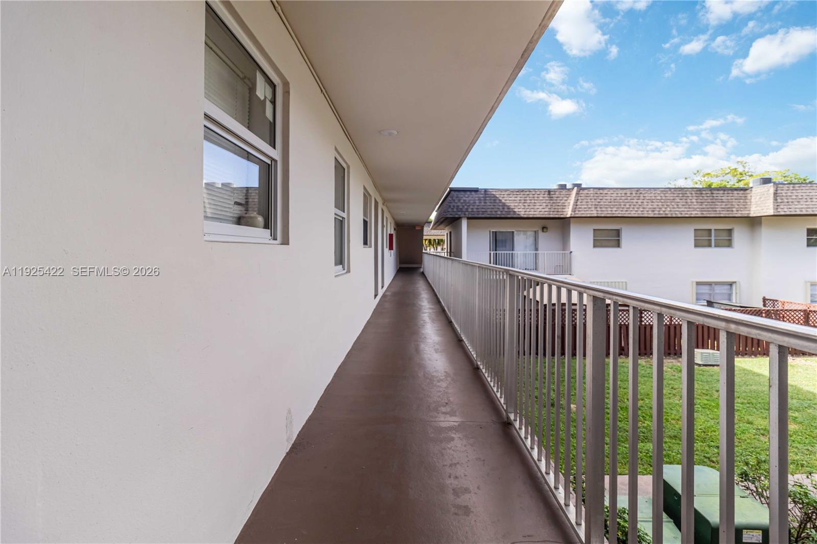 8475 Southwest 94th Street, Unit 217E Miami, FL 33156 - Photo 15 of 21 a view of a house with balcony