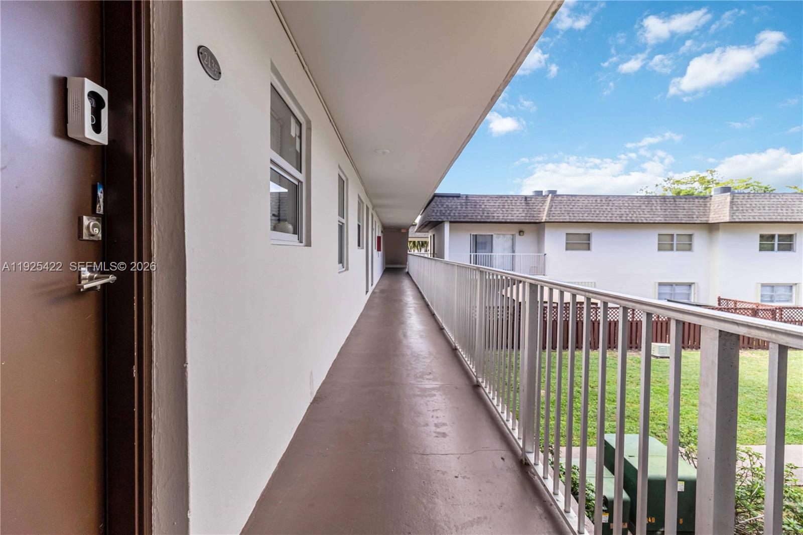 8475 Southwest 94th Street, Unit 217E Miami, FL 33156 - Photo 16 of 21 a view of a house with balcony