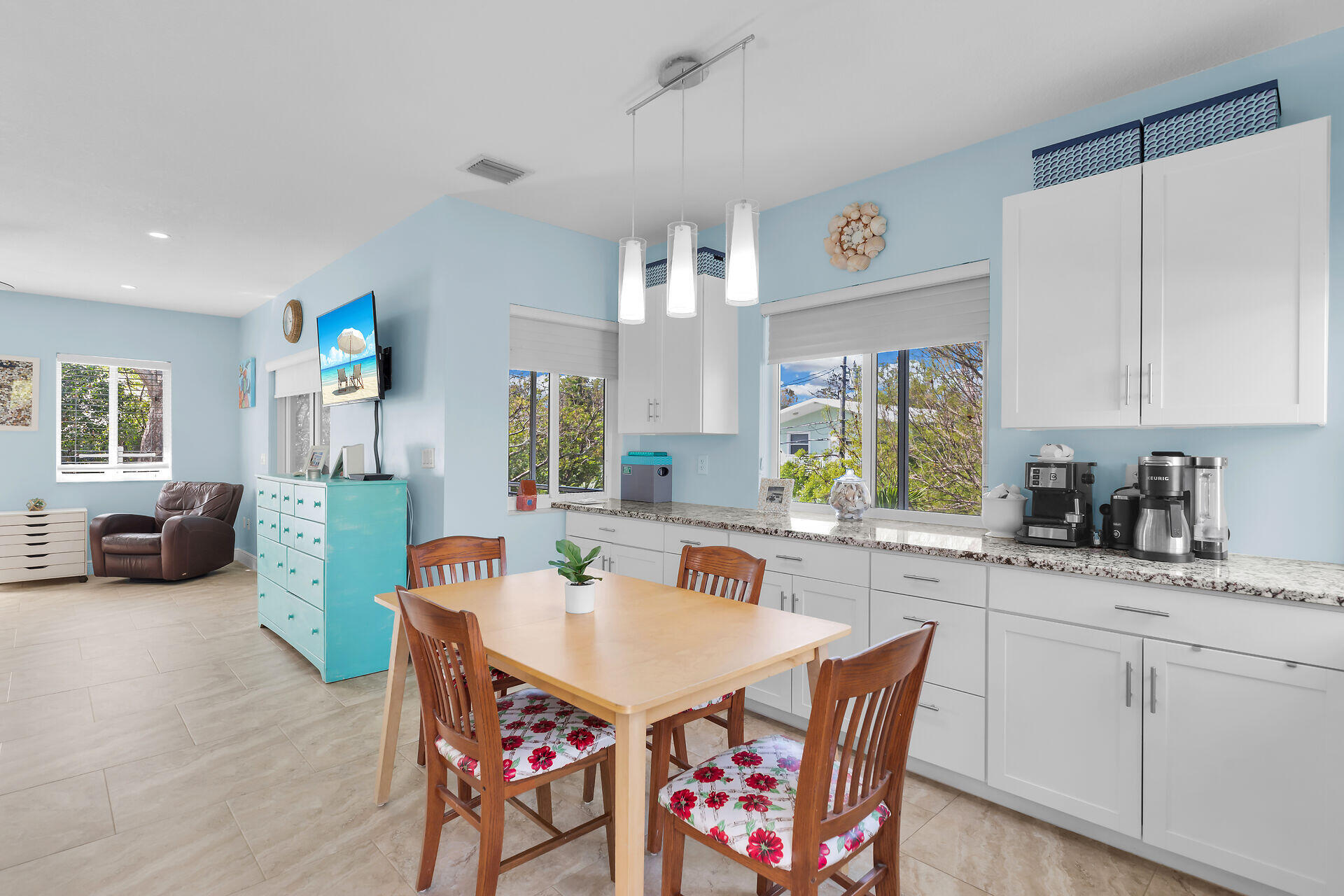 1019 Snapper Lane Key Largo, FL 33037 - Photo 11 of 49 a living room with furniture a flat screen tv and a refrigerator