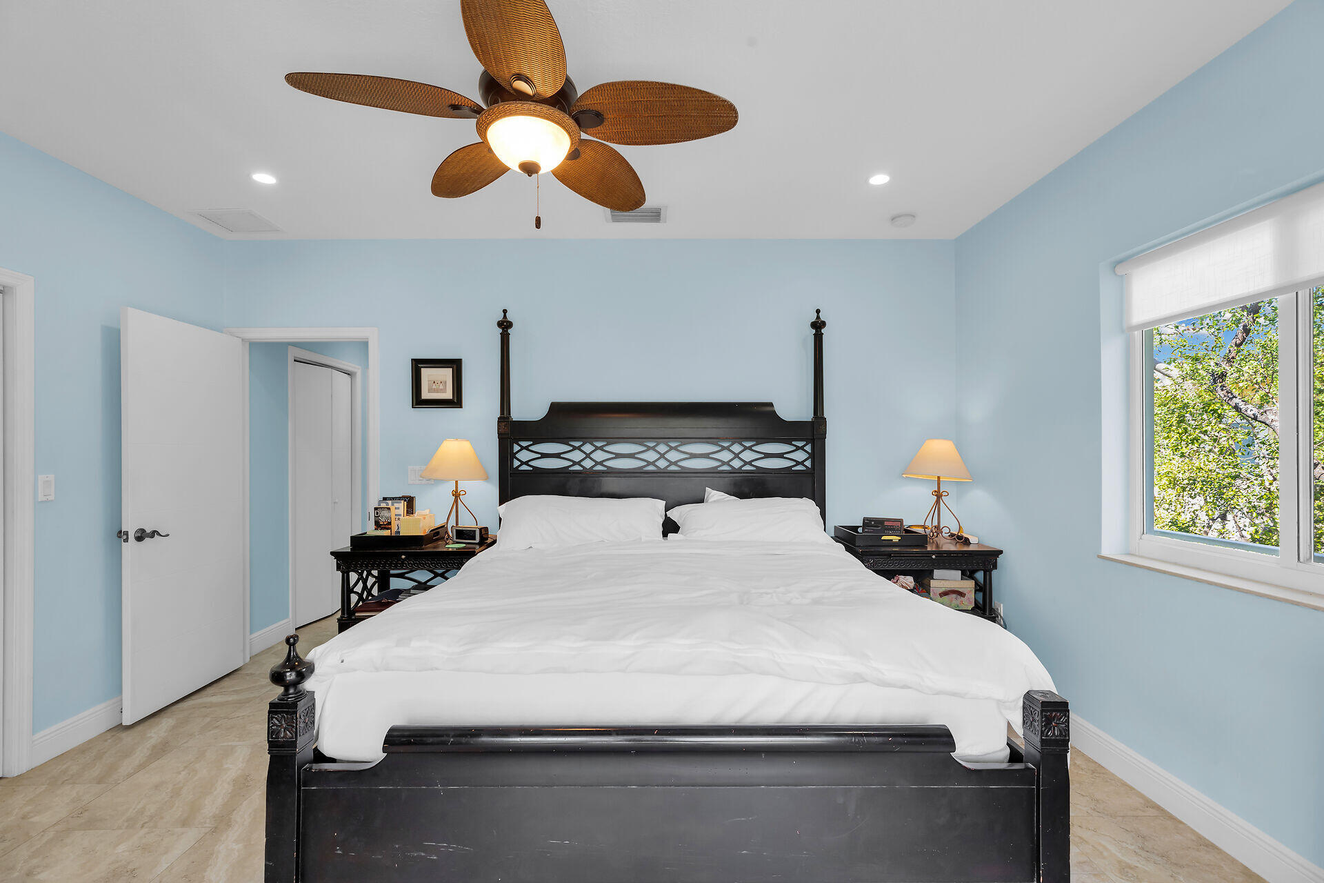 1019 Snapper Lane Key Largo, FL 33037 - Photo 13 of 49 a bedroom with a bed and a window