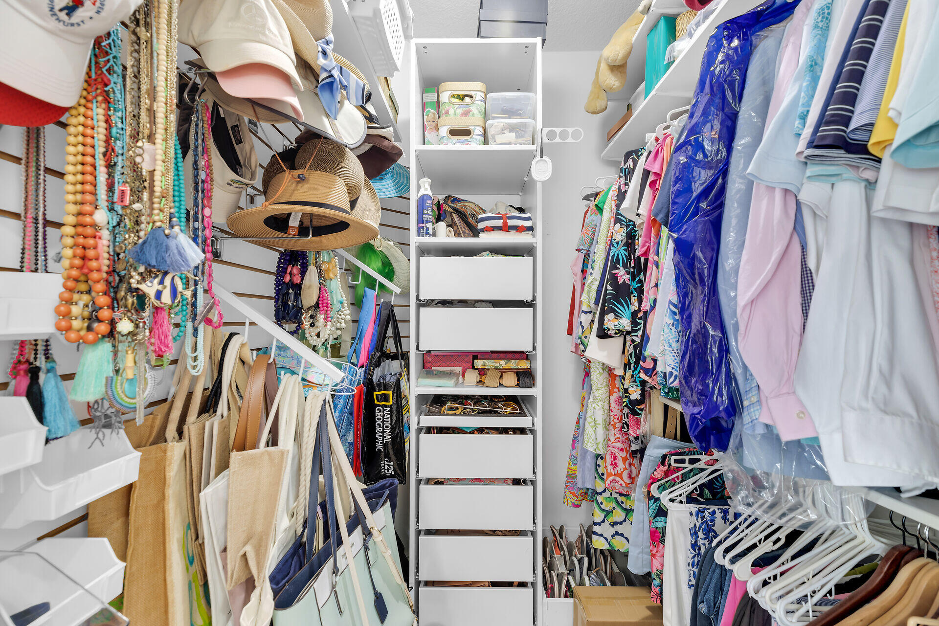 1019 Snapper Lane Key Largo, FL 33037 - Photo 19 of 49 a view of walk in closet with clothes