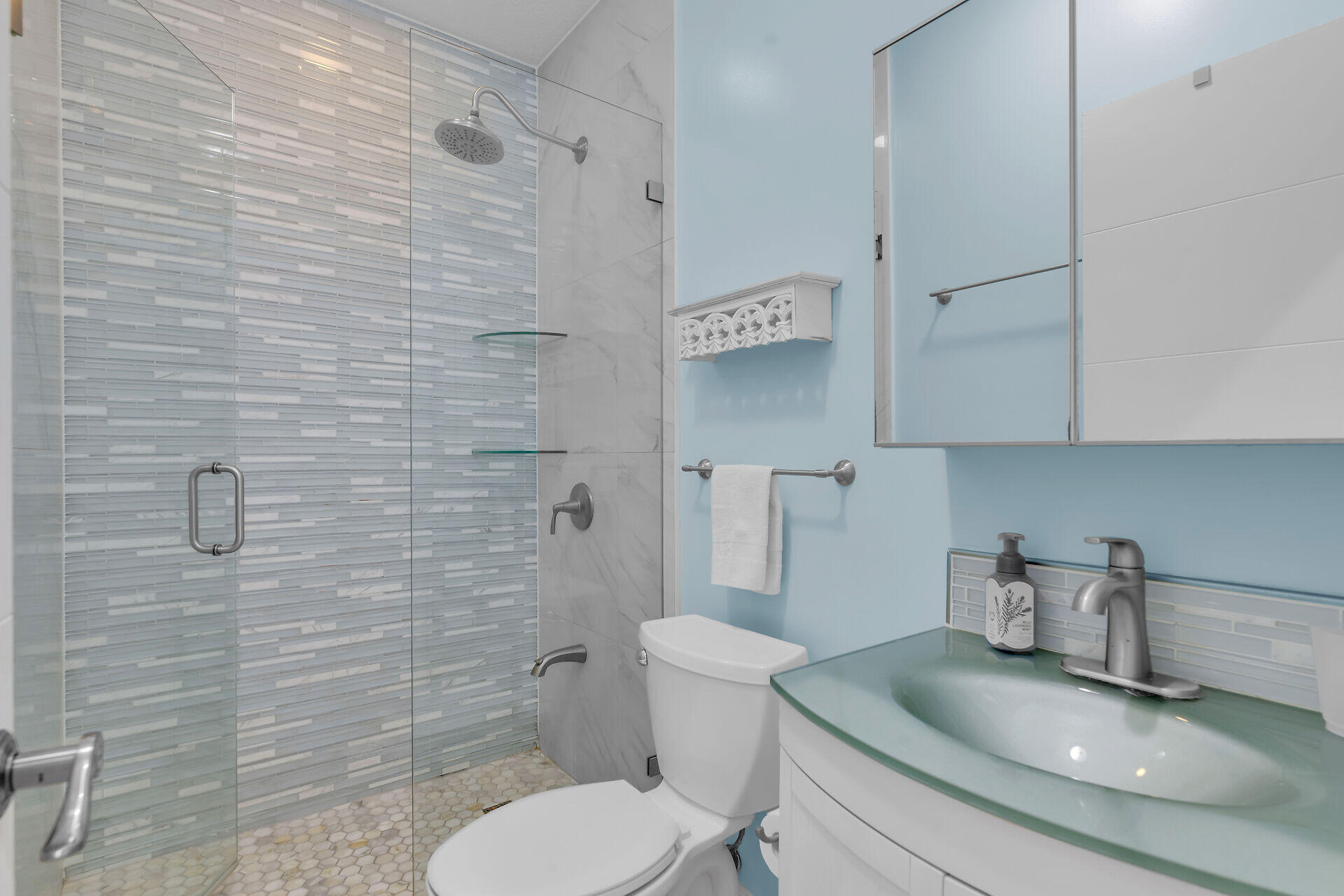 1019 Snapper Lane Key Largo, FL 33037 - Photo 21 of 49 a bathroom with a granite countertop toilet a sink and mirror