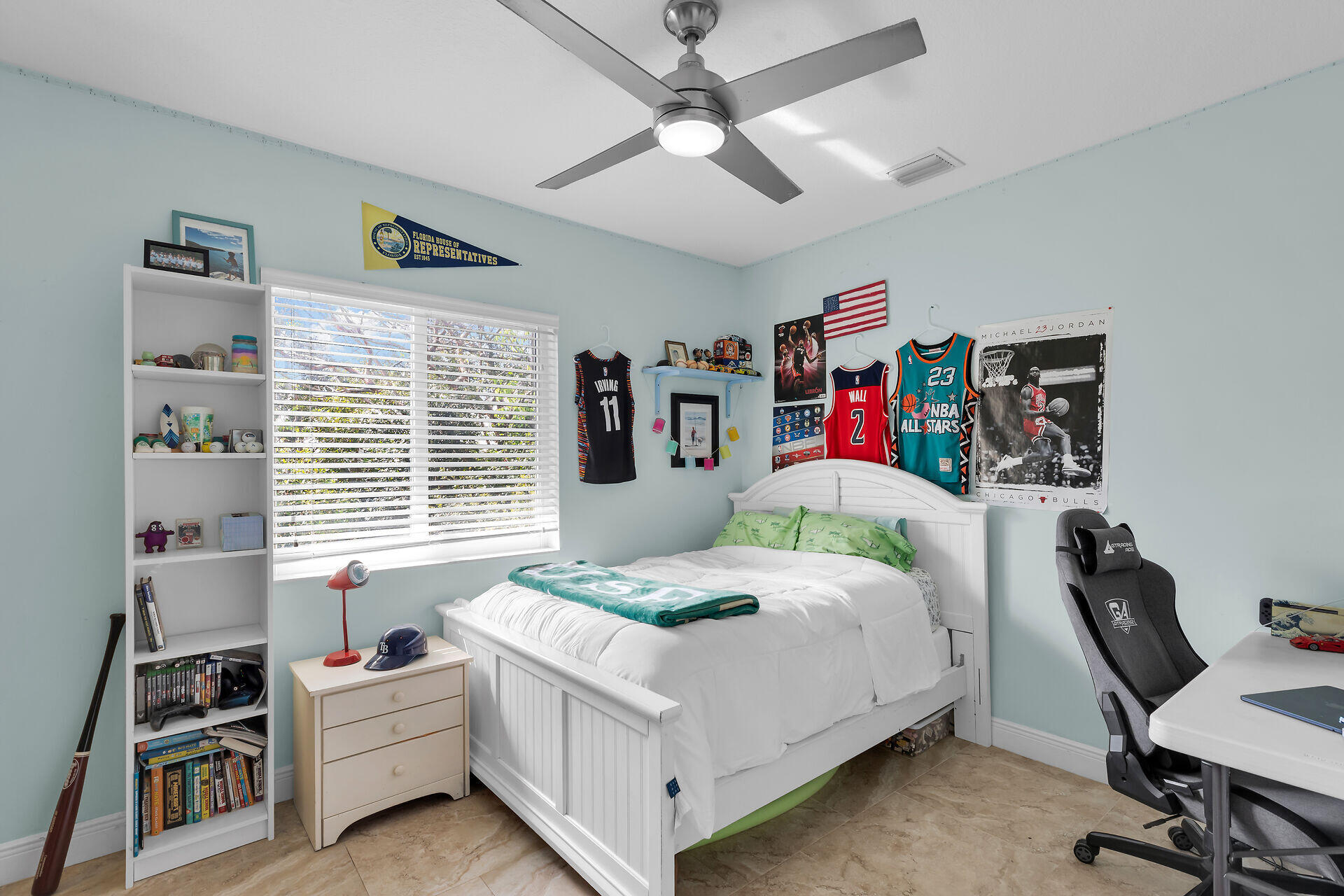 1019 Snapper Lane Key Largo, FL 33037 - Photo 25 of 49 a bedroom with a bed and a desk