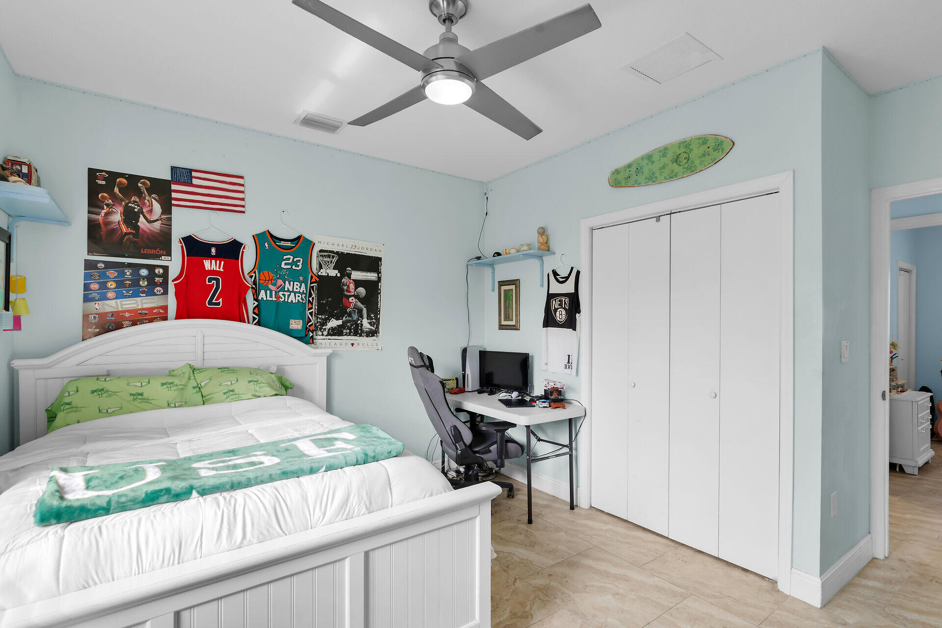 1019 Snapper Lane Key Largo, FL 33037 - Photo 26 of 49 a bedroom with a bed and a desk