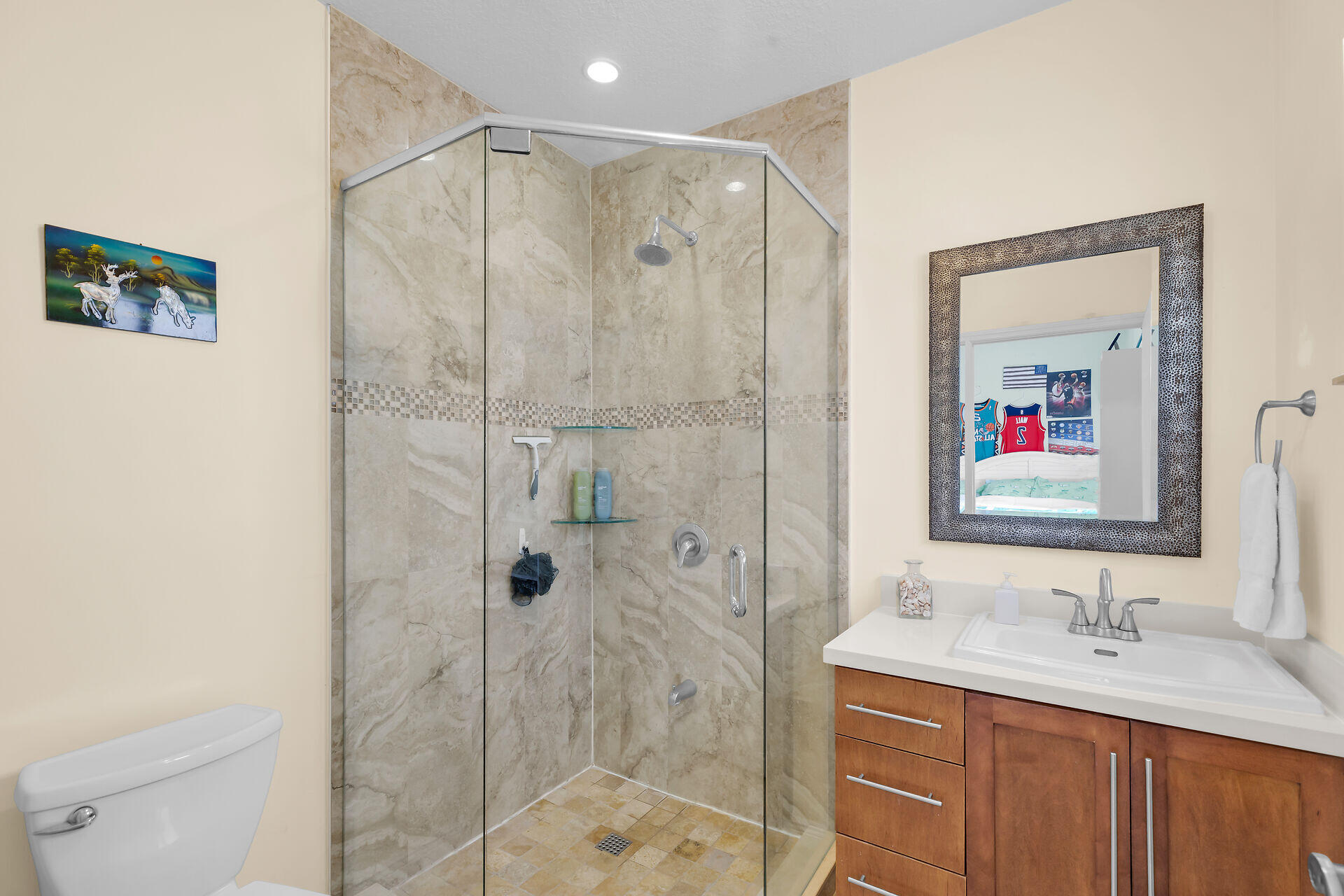 1019 Snapper Lane Key Largo, FL 33037 - Photo 27 of 49 a bathroom with a shower sink vanity mirror and toilet