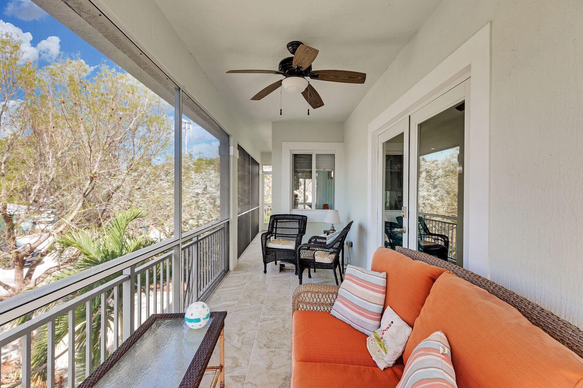 1019 Snapper Lane Key Largo, FL 33037 - Photo 29 of 49 a living room with furniture and a large window