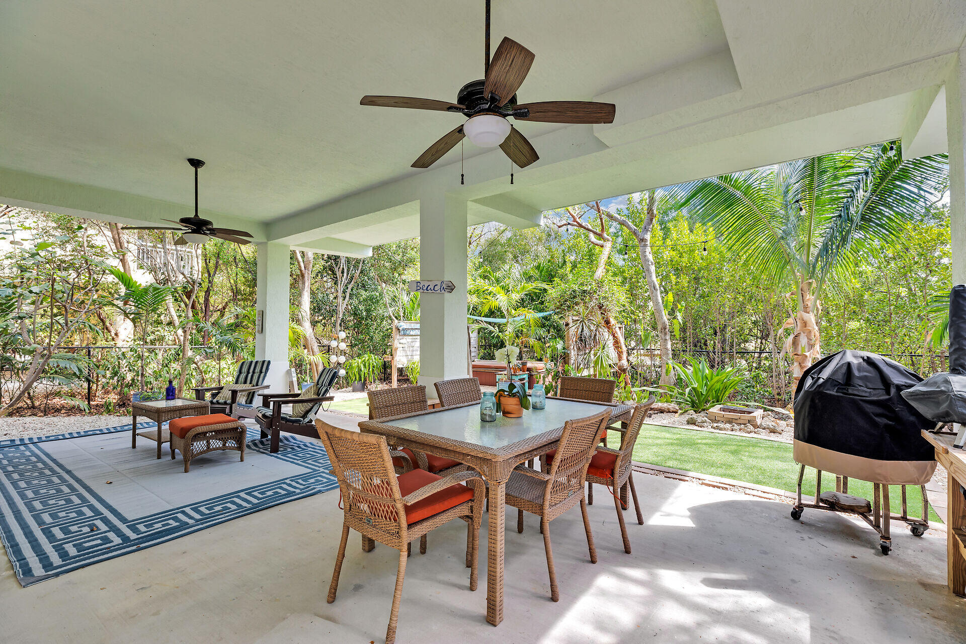 1019 Snapper Lane Key Largo, FL 33037 - Photo 36 of 49 a dining room with furniture and a window