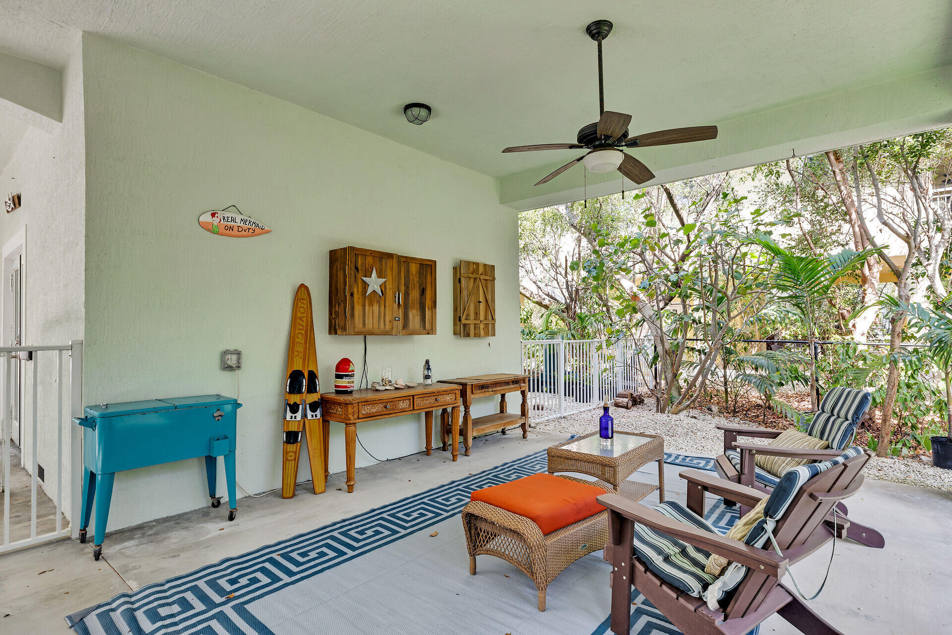 1019 Snapper Lane Key Largo, FL 33037 - Photo 37 of 49 a living room with furniture and a chandelier