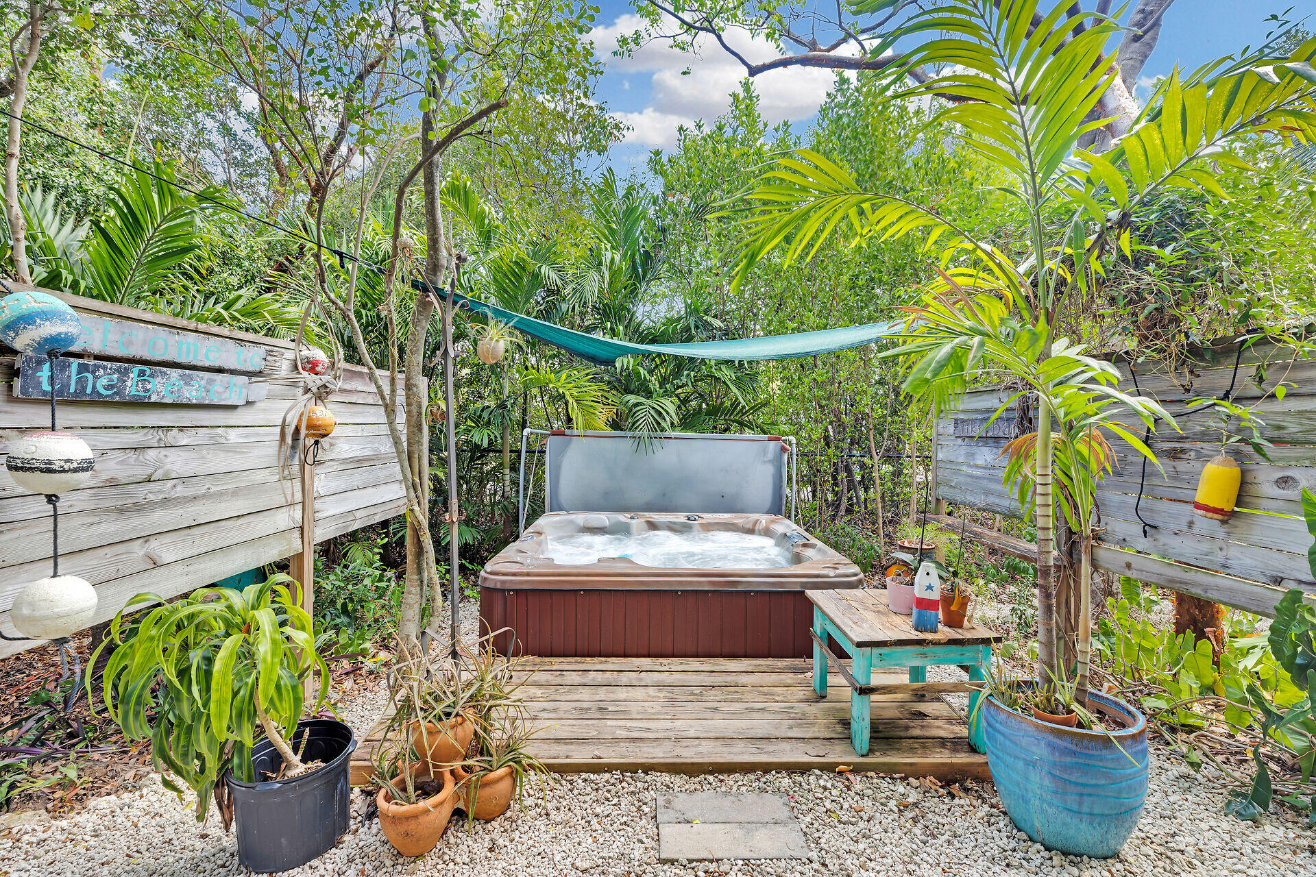 1019 Snapper Lane Key Largo, FL 33037 - Photo 41 of 49 a outdoor living space with furniture and flowers