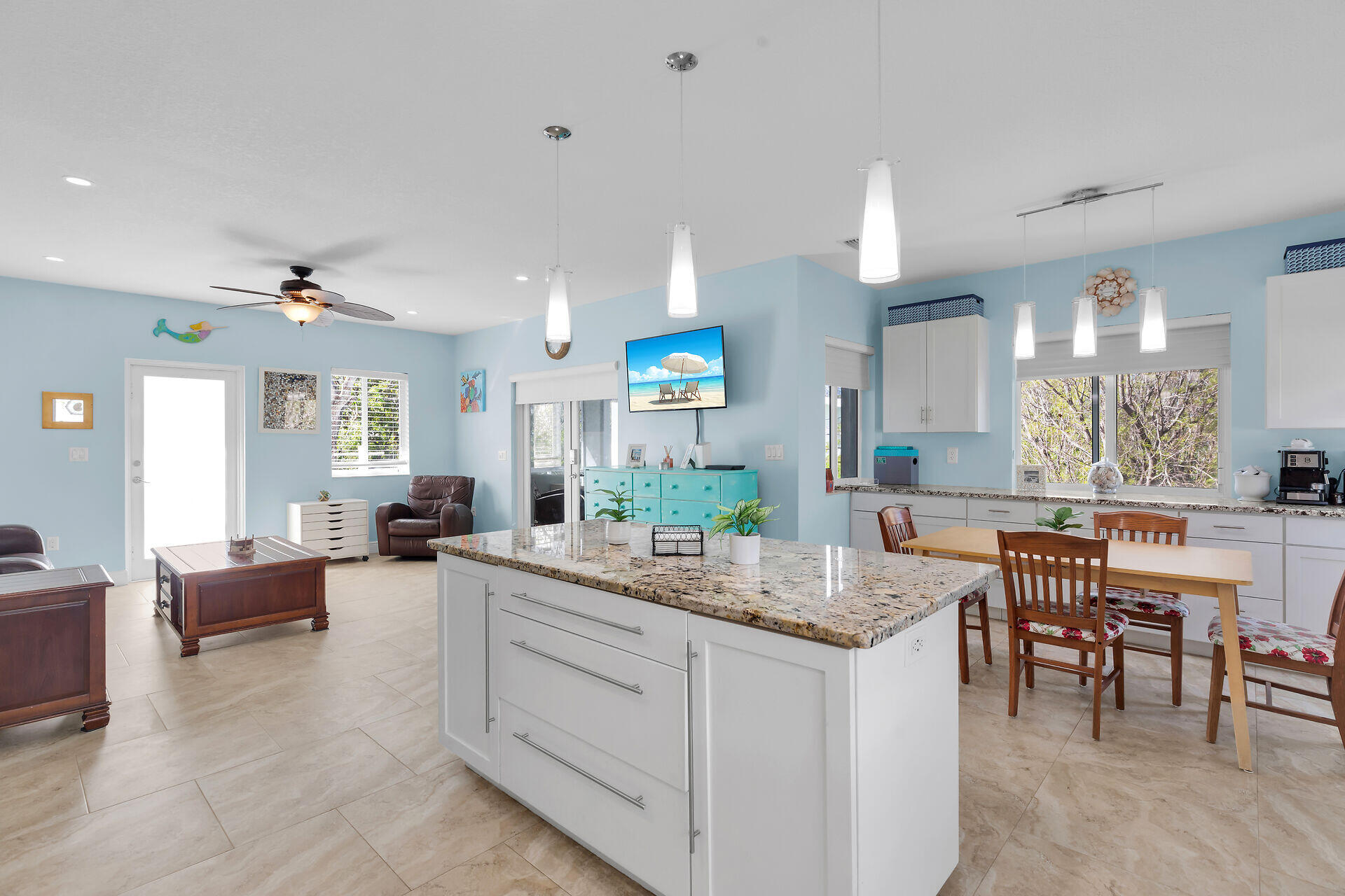 1019 Snapper Lane Key Largo, FL 33037 - Photo 9 of 49 a kitchen with sink and living room