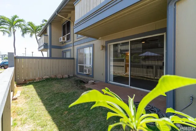 a view of a swimming pool with a backyard