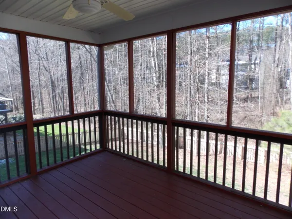 a view of a large window with wooden floor